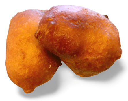 Ambachtelijke oliebollen met knapperige churros en versgebakken wafels, populair op wintermarkten en evenementen in heel Nederland.